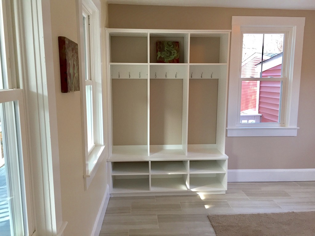 144 Pleasant Street Raynham, MA 02767 - Photo 27 of 29 a view of front door with a glass door
