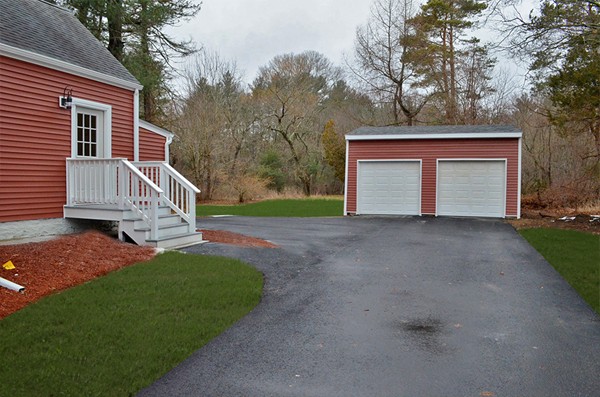 144 Pleasant Street Raynham, MA 02767 - Photo 29 of 29 a view of a house with a yard