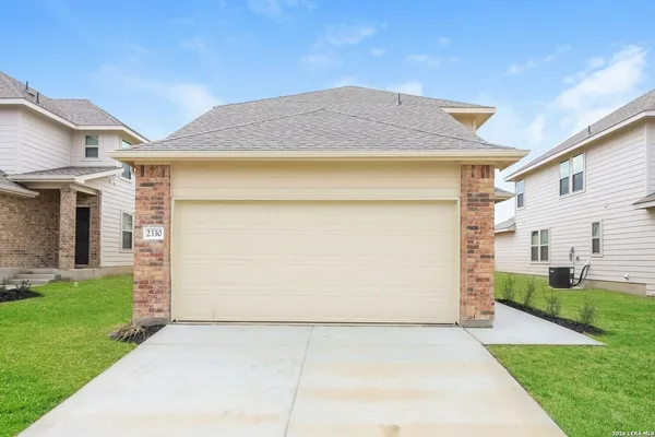 a front view of house with yard