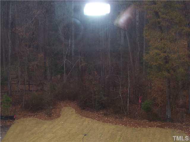 5509 Moneta Lane Cary, NC 27539 - Photo 10 of 12 Treelined backyard