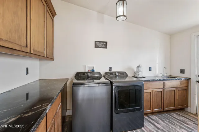 a bedroom with a bed window and a flat screen tv