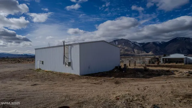 a living room with lots of furniture and a rug
