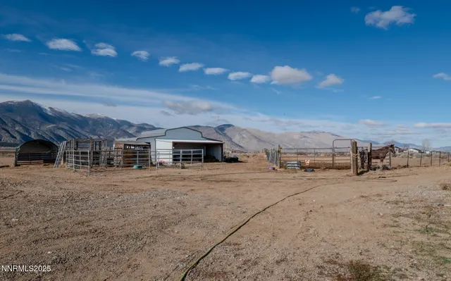 a view of an ocean beach and mountain