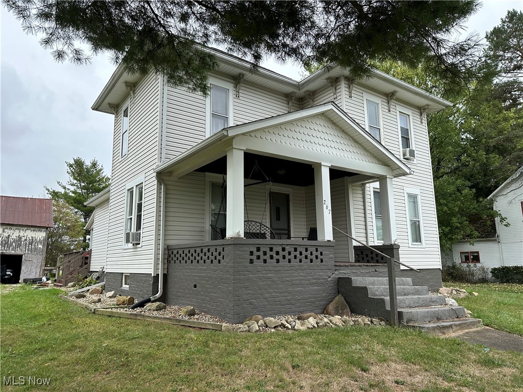 267 State Rte 511 Nova, OH 44859 - Photo 1 of 20 View of front of home with cooling unit, covered porch, and a front yard
