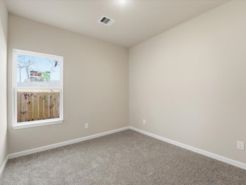 8708 Wileyvale Road Houston, TX 77016 - Photo 13 of 23 an empty room with a window