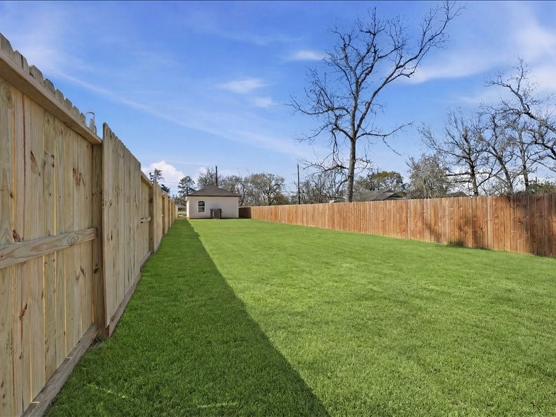 8708 Wileyvale Road Houston, TX 77016 - Photo 22 of 23 a view of a back yard