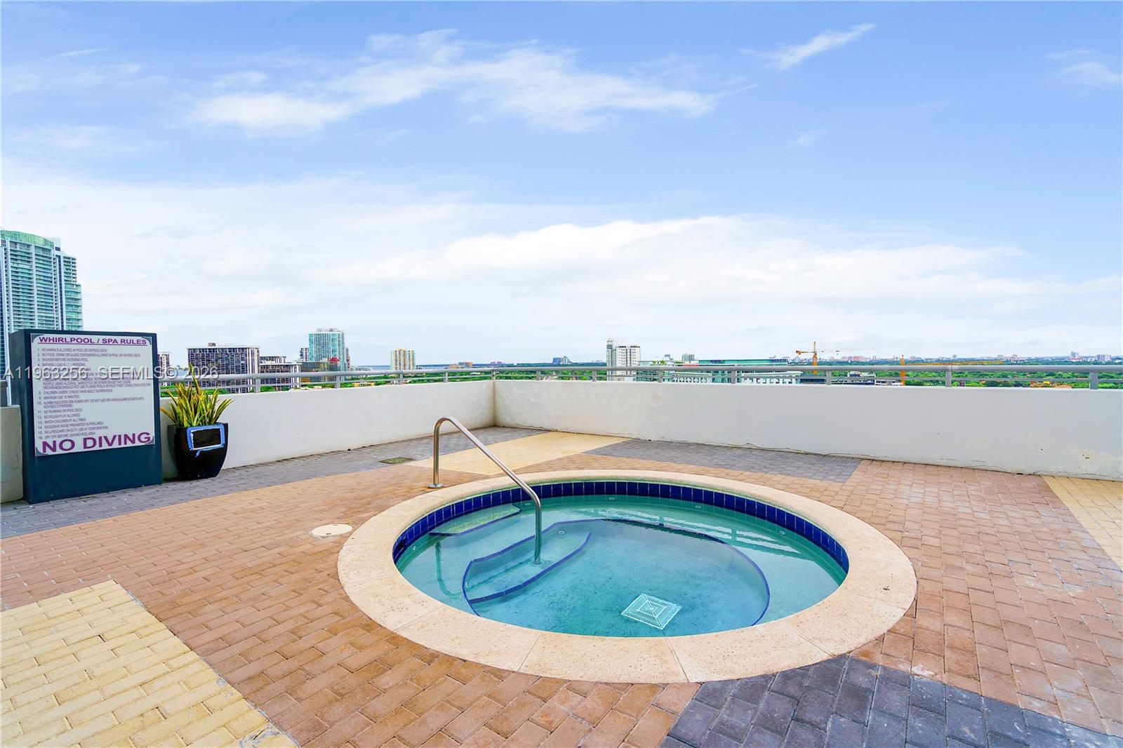 60 Southwest 13th Street, Unit 3416 Miami, FL 33130 - Photo 5 of 20 a view of a swimming pool with a terrace