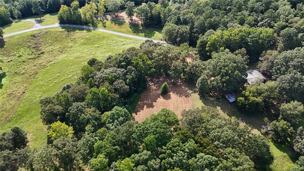 Lot 2 Snote Jones Road Dallas, GA 30132 - Photo 9 of 26 an aerial view of residential house with outdoor space and trees all around