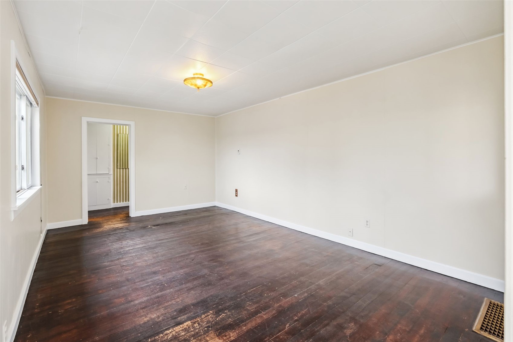 532 Front Street Fairplay, CO 80440 - Photo 17 of 46 an empty room with wooden floor and windows