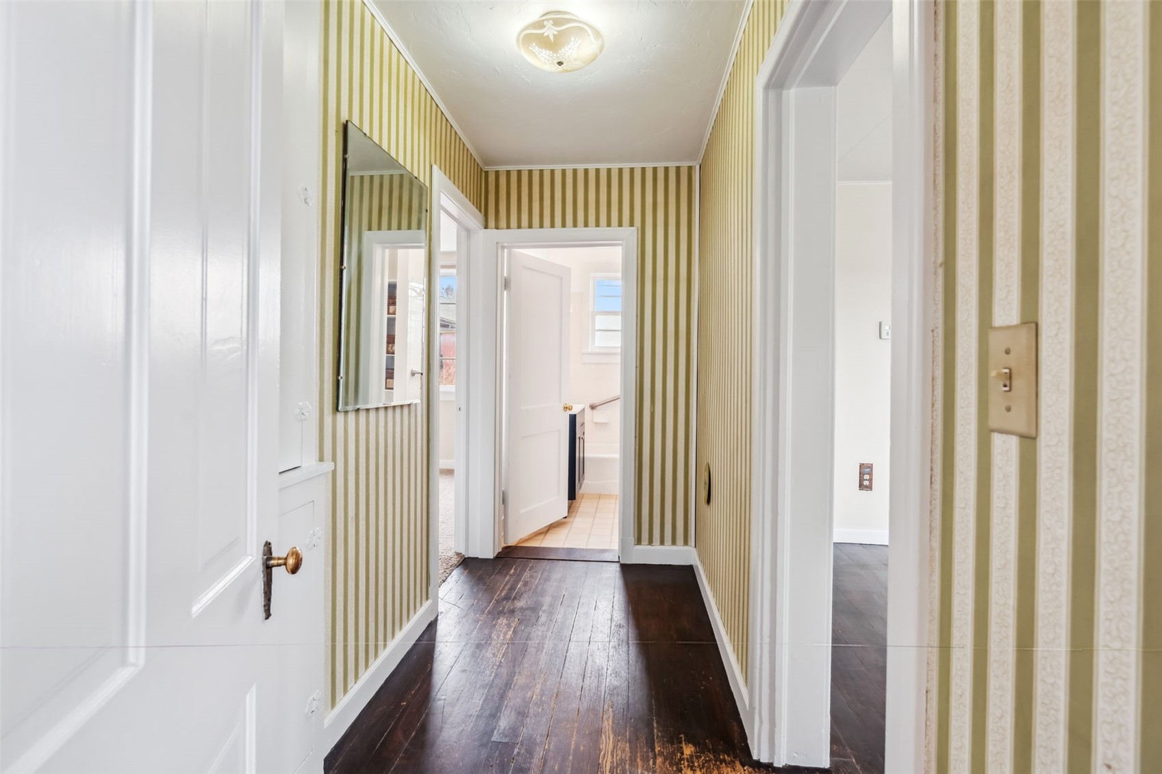 532 Front Street Fairplay, CO 80440 - Photo 18 of 46 a view of a hallway with wooden floor and staircase