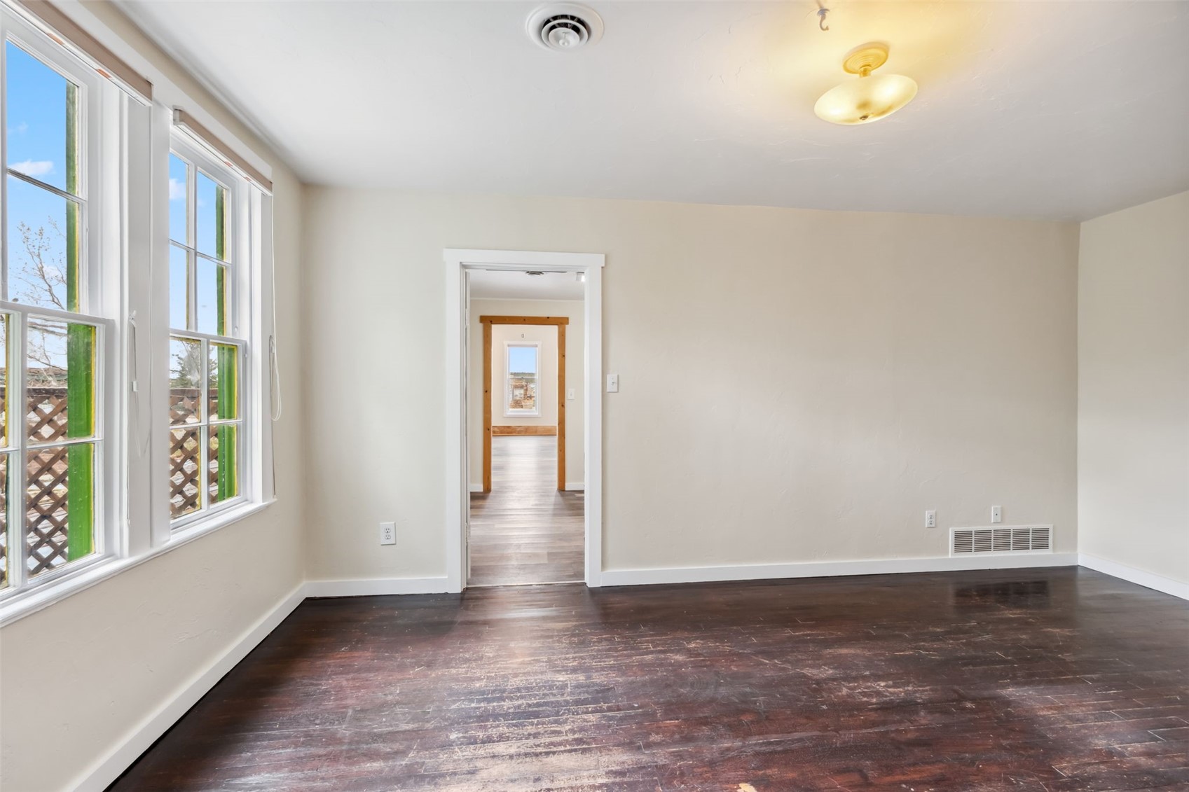 532 Front Street Fairplay, CO 80440 - Photo 27 of 46 a view of an empty room with a window and wooden floor