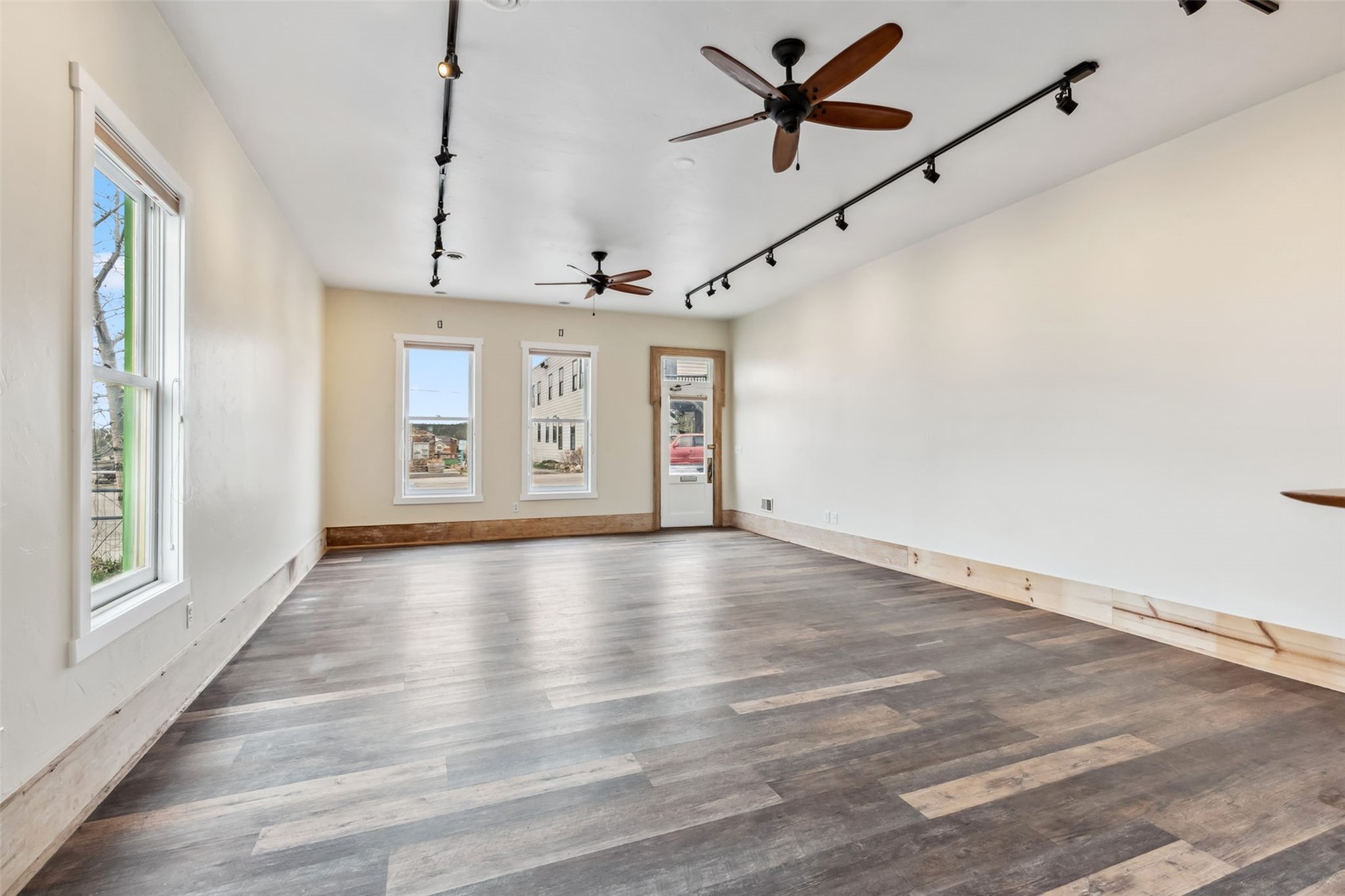 532 Front Street Fairplay, CO 80440 - Photo 33 of 46 a view of a livingroom with a ceiling fan window and hardwood floor