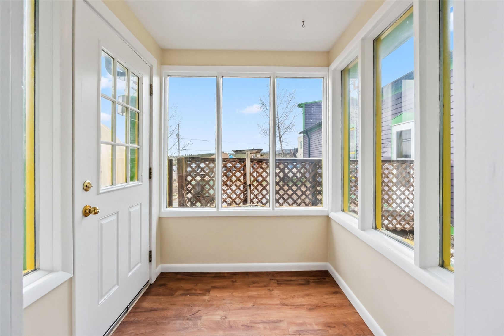 532 Front Street Fairplay, CO 80440 - Photo 5 of 46 a view of an entryway with wooden floor and windows