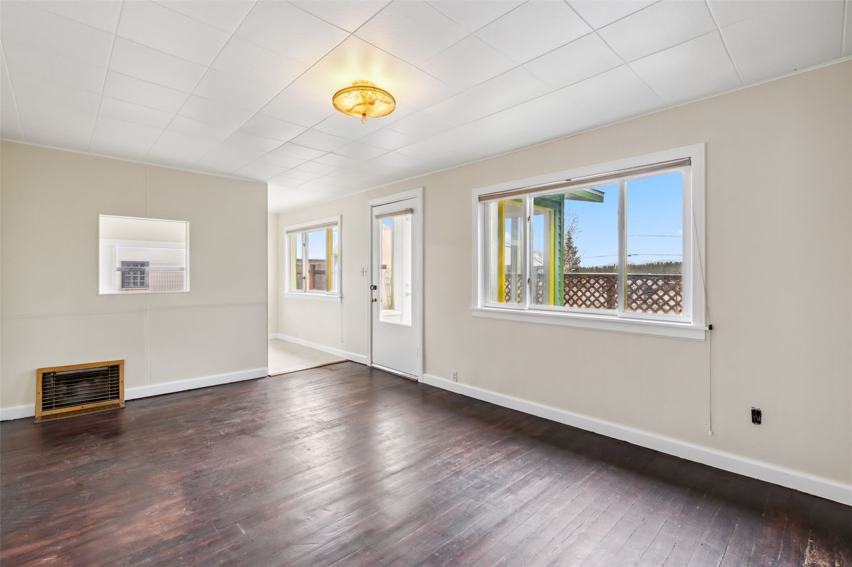 532 Front Street Fairplay, CO 80440 - Photo 6 of 46 a view of an empty room with window and wooden floor