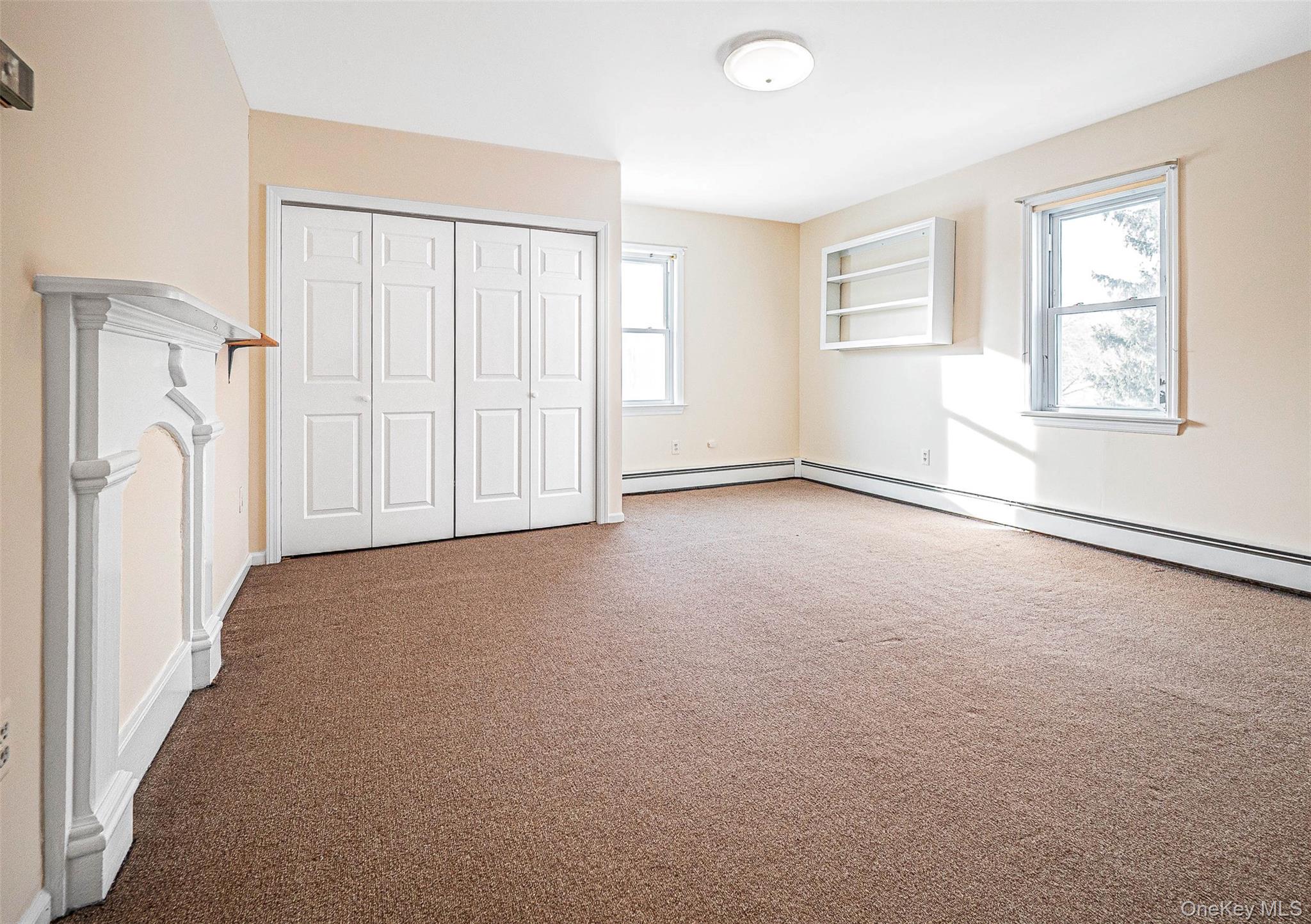 238 South Centerville Road Middletown, NY 10940 - Photo 17 of 28 an empty room with windows and closet