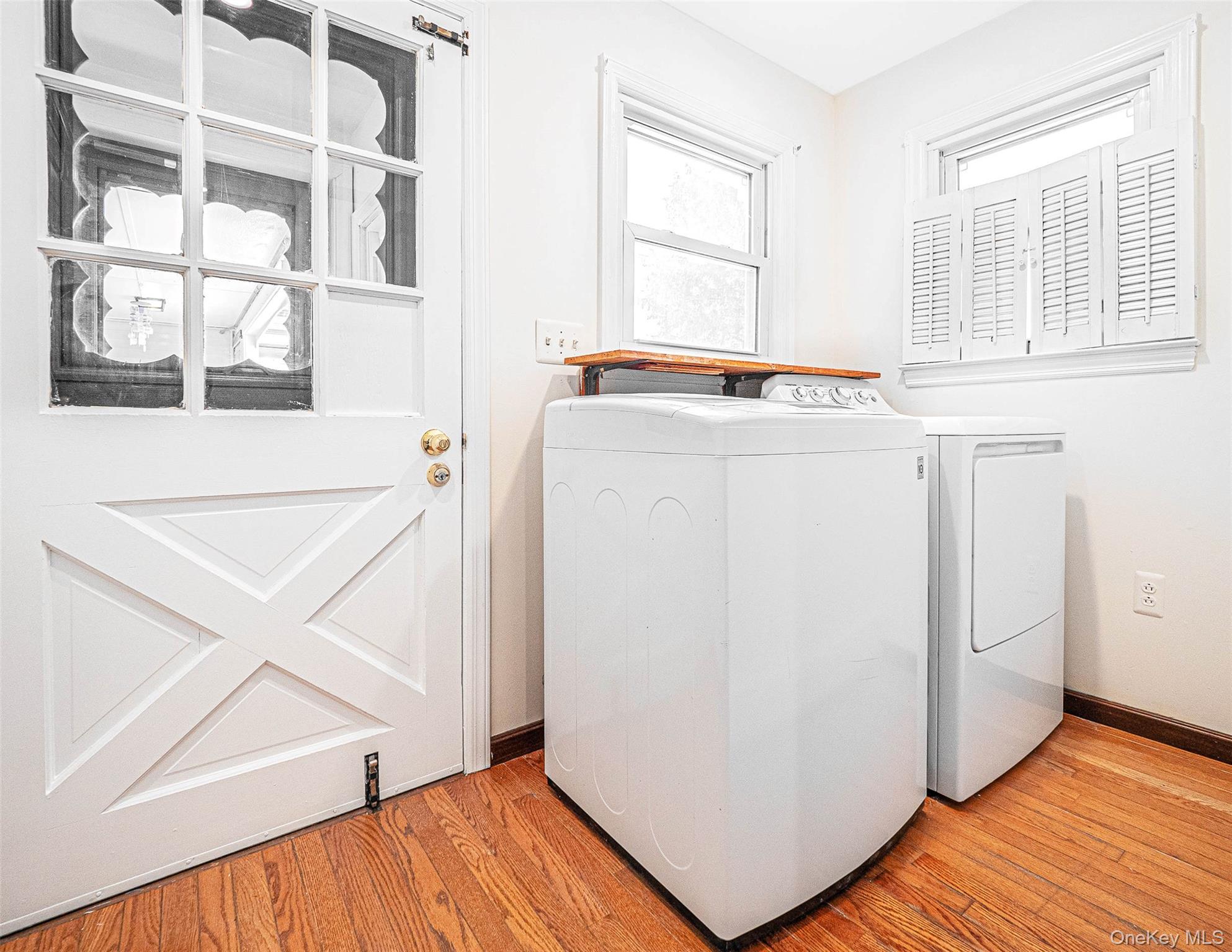 238 South Centerville Road Middletown, NY 10940 - Photo 9 of 28 a view of walk in closet with window and wooden floor