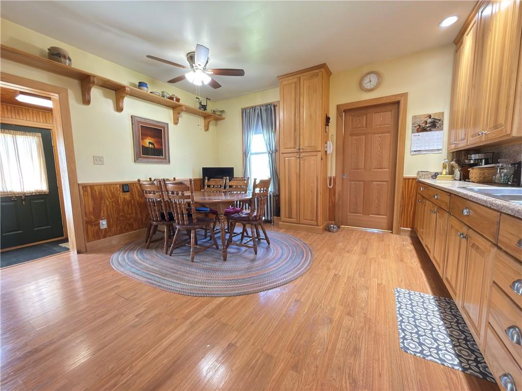 122 Coal Bank Road Greenville, PA 16125 - Photo 26 of 50 a view of a dining room with furniture window and wooden floor