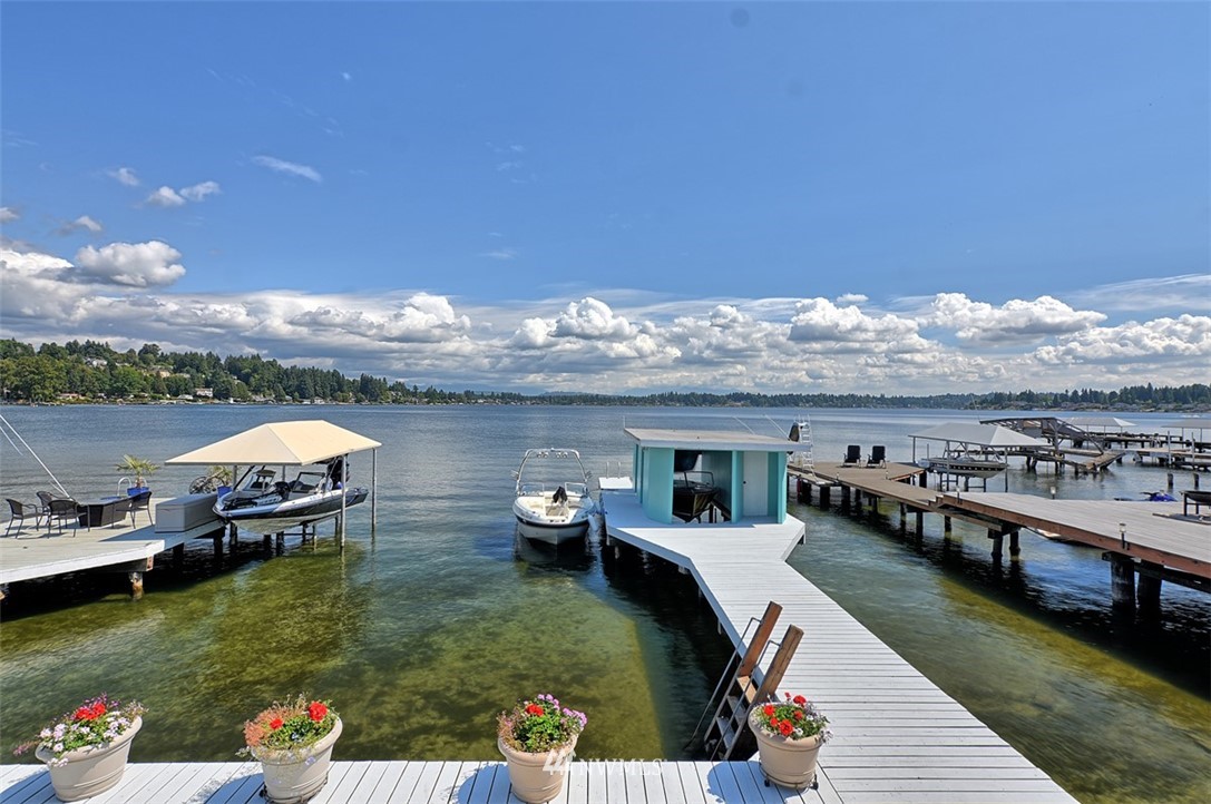 2017 Vernon Road Lake Stevens, WA 98258 - Photo 2 of 25 a balcony with dining table and chairs