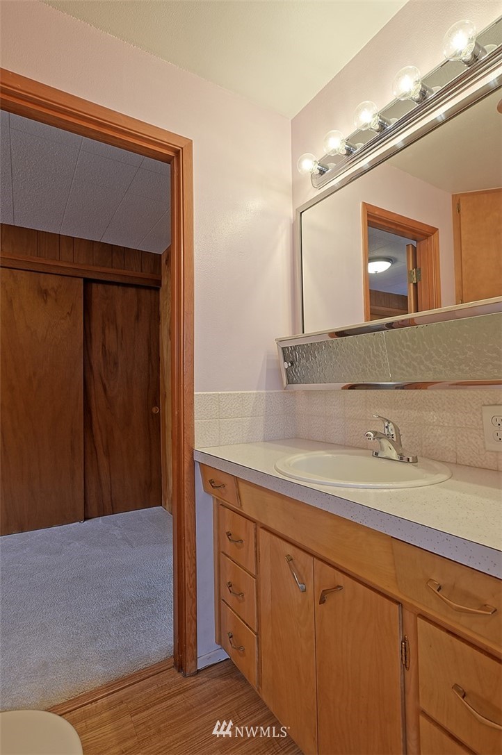 2017 Vernon Road Lake Stevens, WA 98258 - Photo 18 of 25 a bathroom with a sink and a mirror