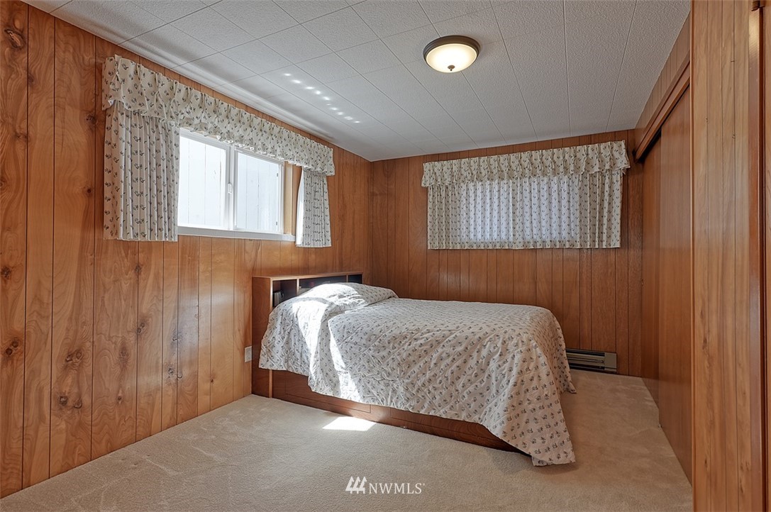 2017 Vernon Road Lake Stevens, WA 98258 - Photo 19 of 25 a bedroom with a bed and a window