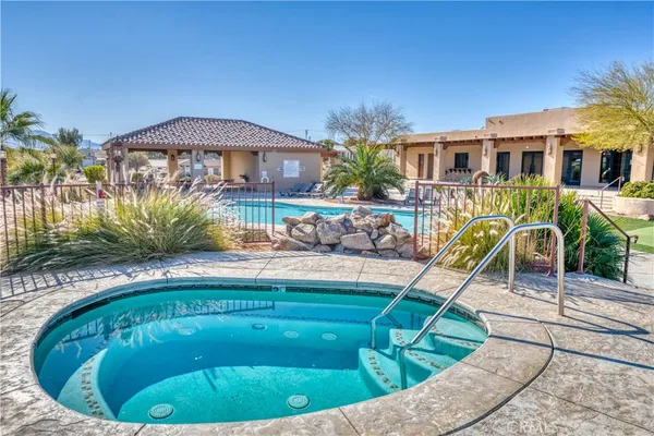 a view of a house with a swimming pool