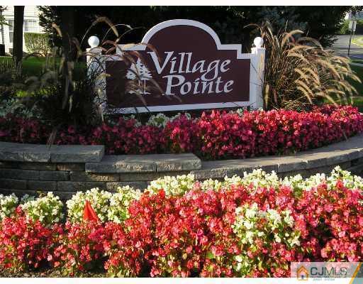 2 Inverness Drive Edison, NJ 08820 - Photo 1 of 14 a view of sign board with plants