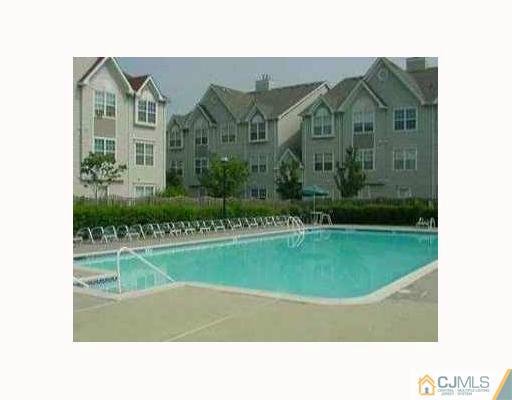 2 Inverness Drive Edison, NJ 08820 - Photo 14 of 14 a picture of a park in front of the house