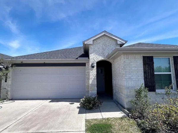 a front view of a house with shower
