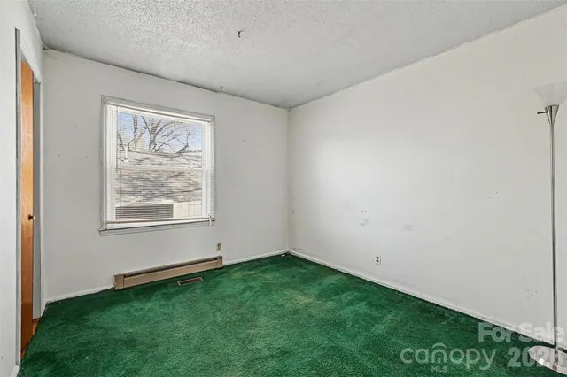 a view of an empty room with window