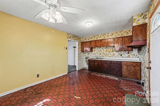 a view of room with wooden floor