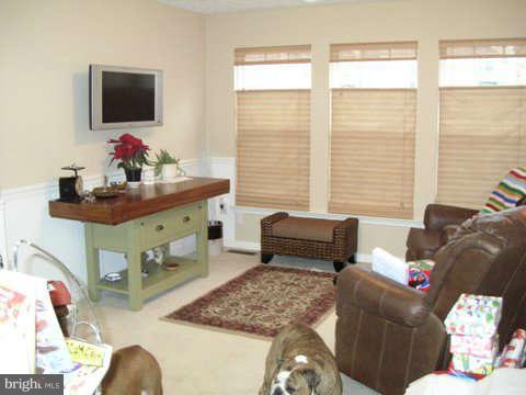 2413 High Brandy Way Odenton, MD 21113 - Photo 5 of 6 a living room with furniture and a flat screen tv