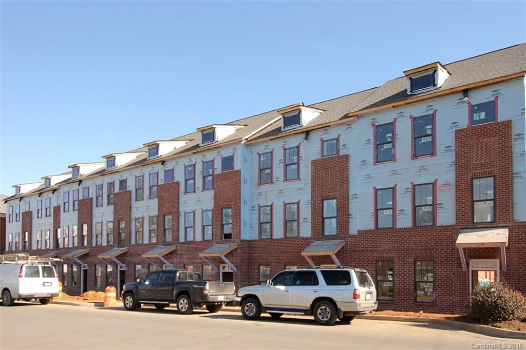 552 Jetton Street, Unit 4 Davidson, NC 28036 - Photo 6 of 12 a car parked in front of a building