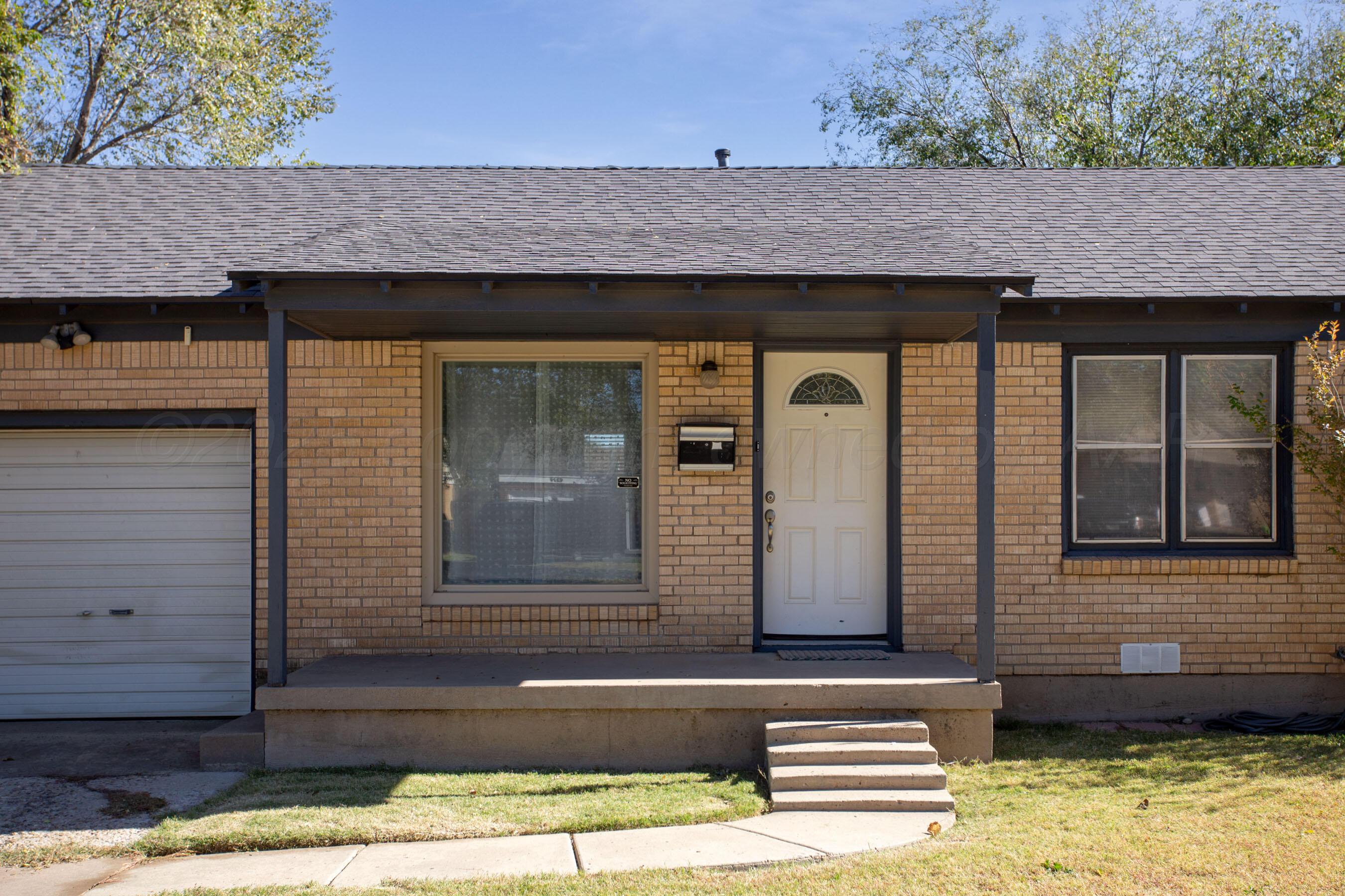 4215 South Travis Street Amarillo, TX 79110 - Photo 20 of 20 a front view of a house