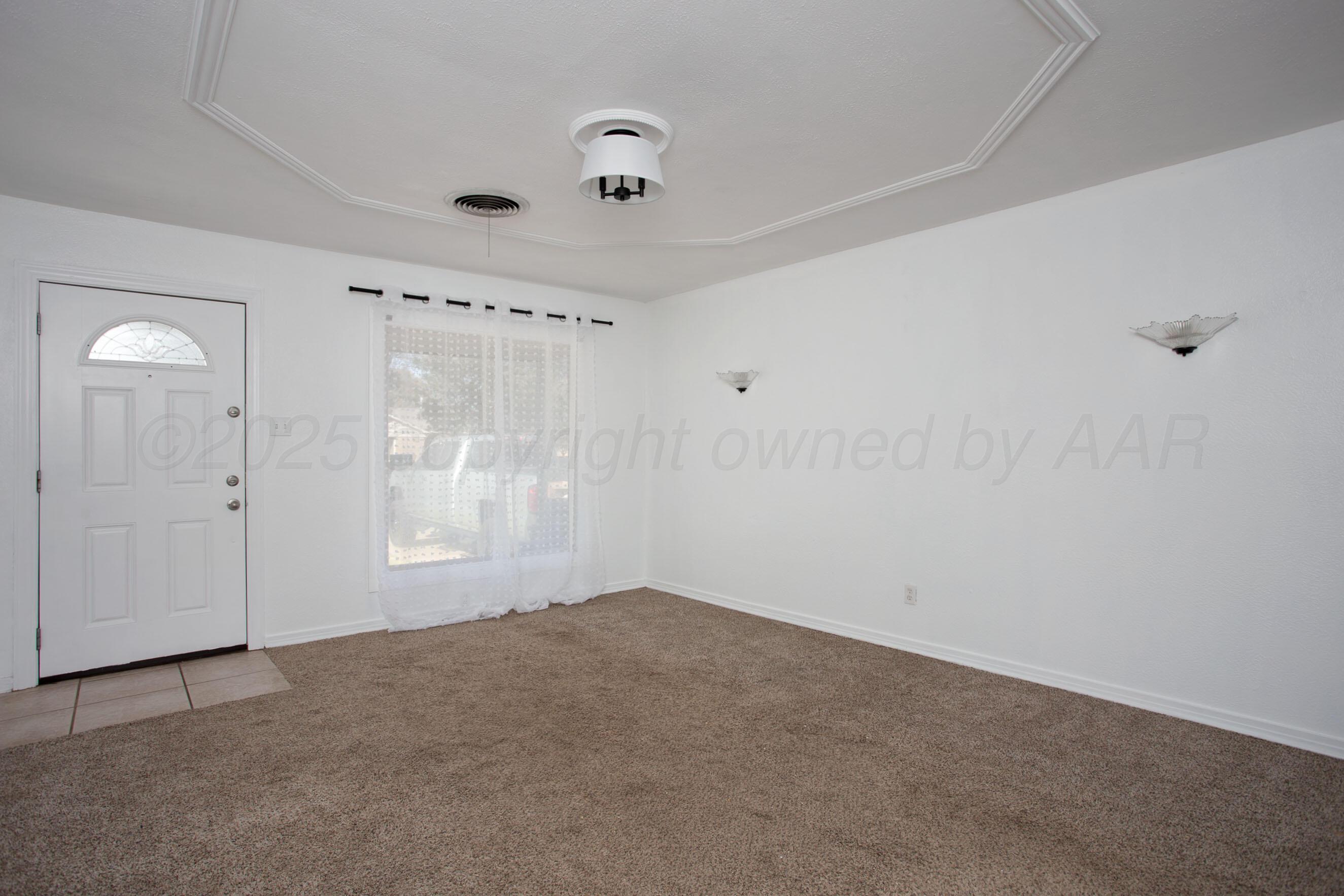 4215 South Travis Street Amarillo, TX 79110 - Photo 4 of 20 a view of empty room