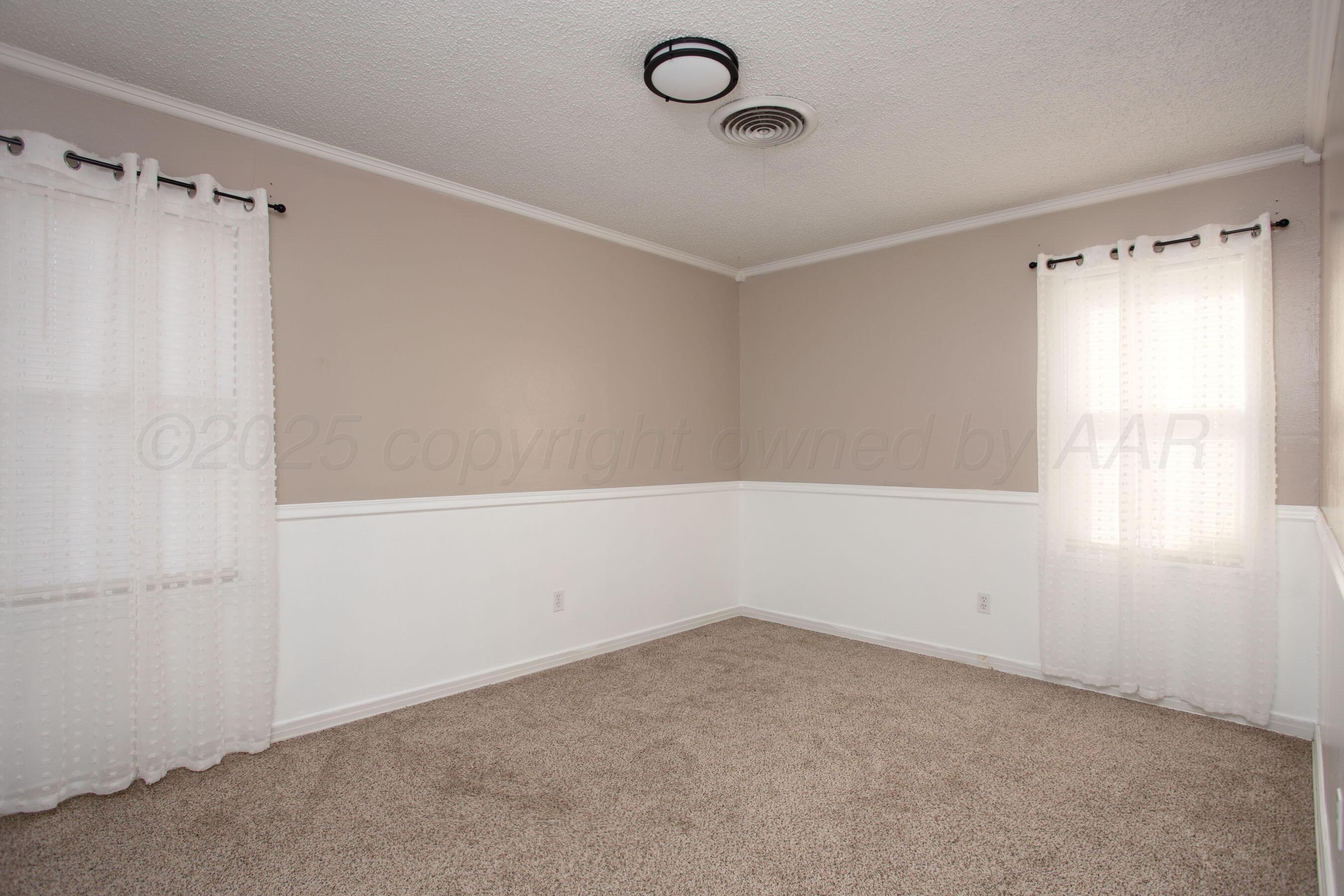 4215 South Travis Street Amarillo, TX 79110 - Photo 8 of 20 a view of an empty room