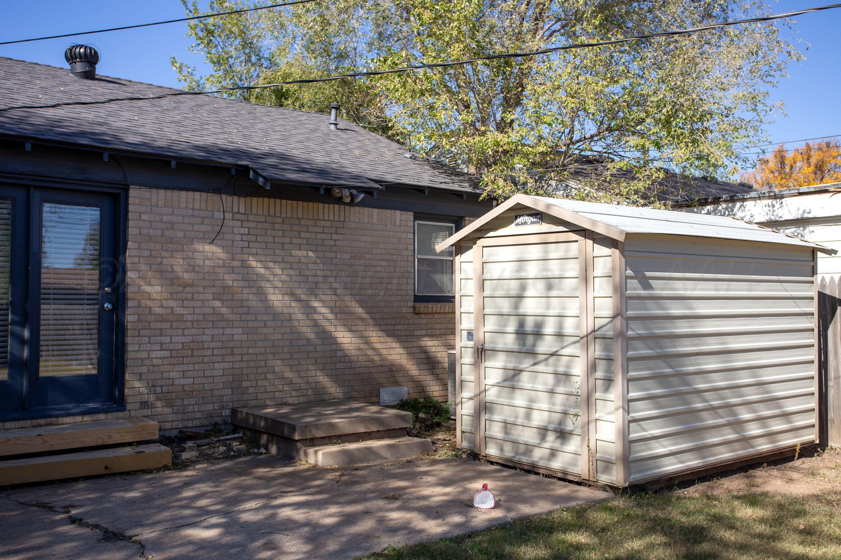 4215 South Travis Street Amarillo, TX 79110 - Photo 10 of 20 a view of entrance gate of the house
