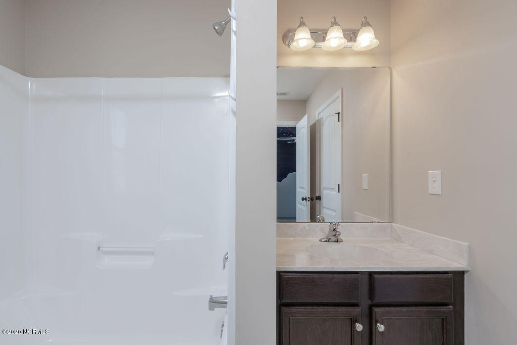 8045 Footpath Road Leland, NC 28451 - Photo 28 of 45 En-suite Bath to Guest Bedroom 4