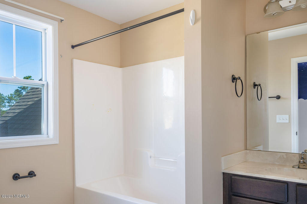 8045 Footpath Road Leland, NC 28451 - Photo 29 of 45 En-suite Bath to Guest Bedroom 4