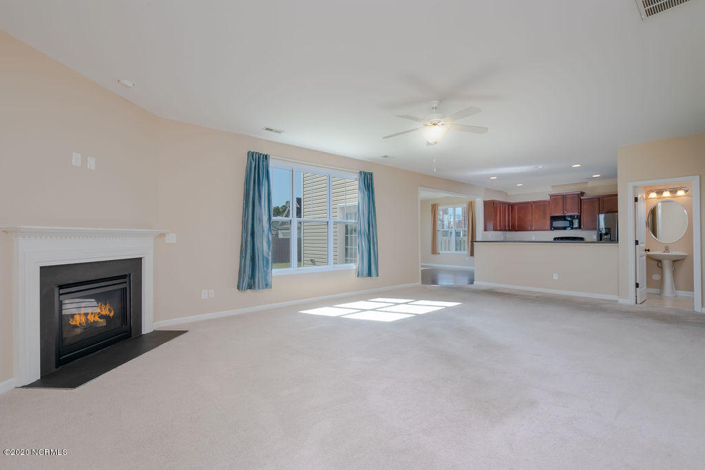 8045 Footpath Road Leland, NC 28451 - Photo 5 of 45 Living room with fireplace