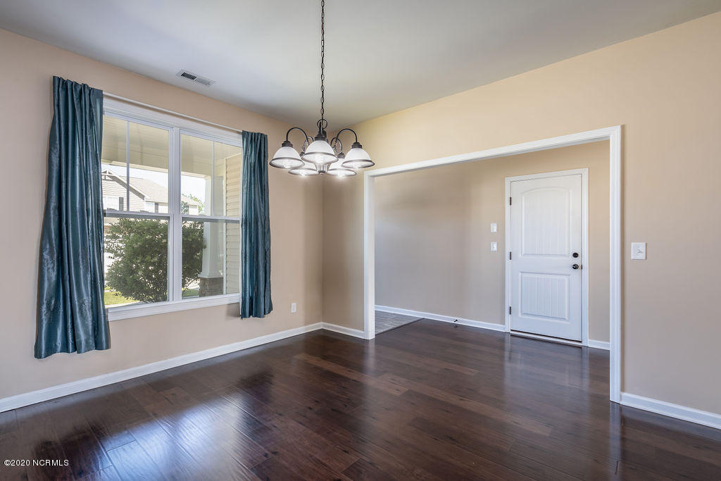 8045 Footpath Road Leland, NC 28451 - Photo 6 of 45 Dining room, tiled foyer