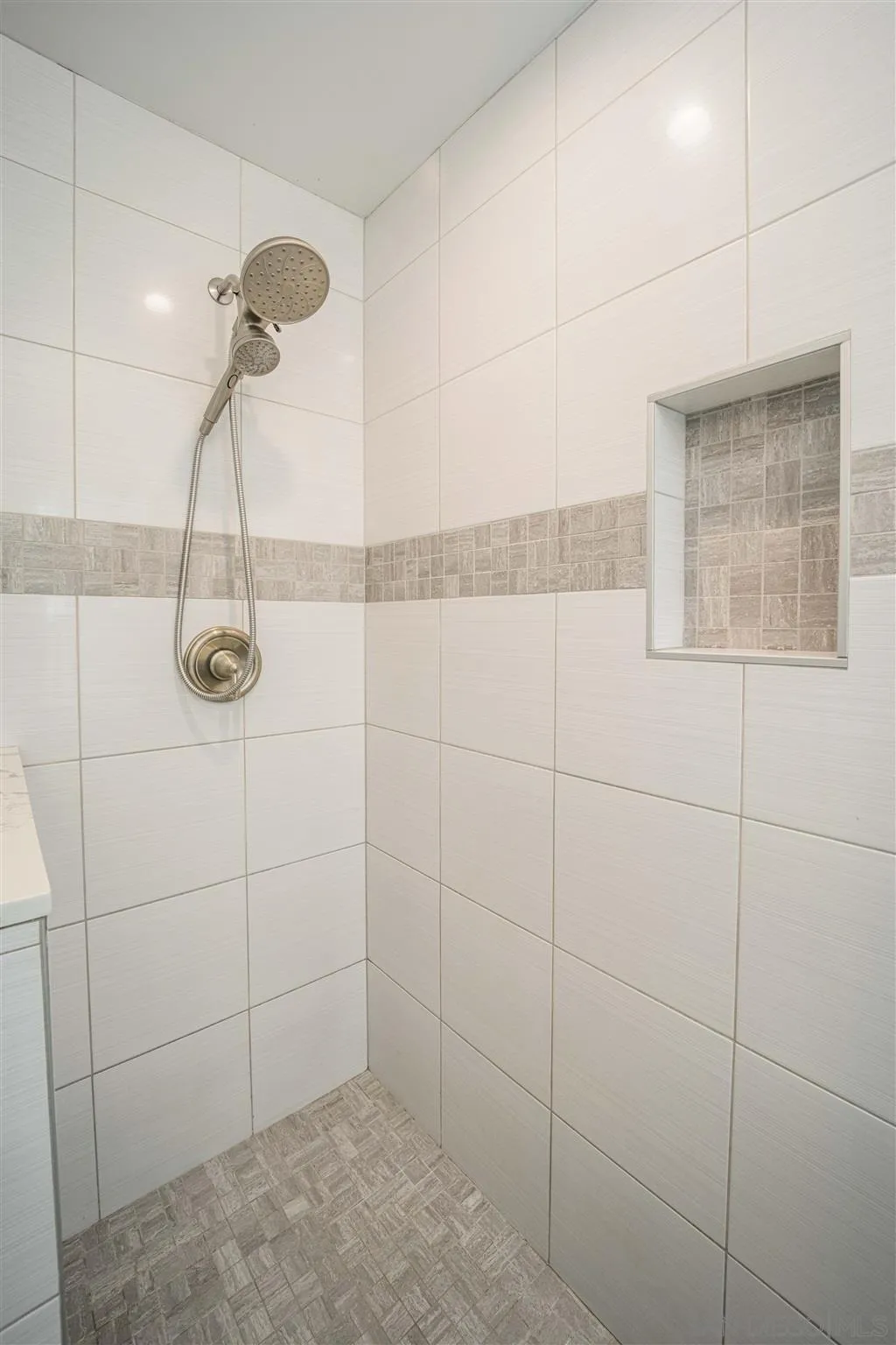 962 Wilfred Street El Cajon, CA 92021 - Photo 16 of 27 a bathroom with a shower