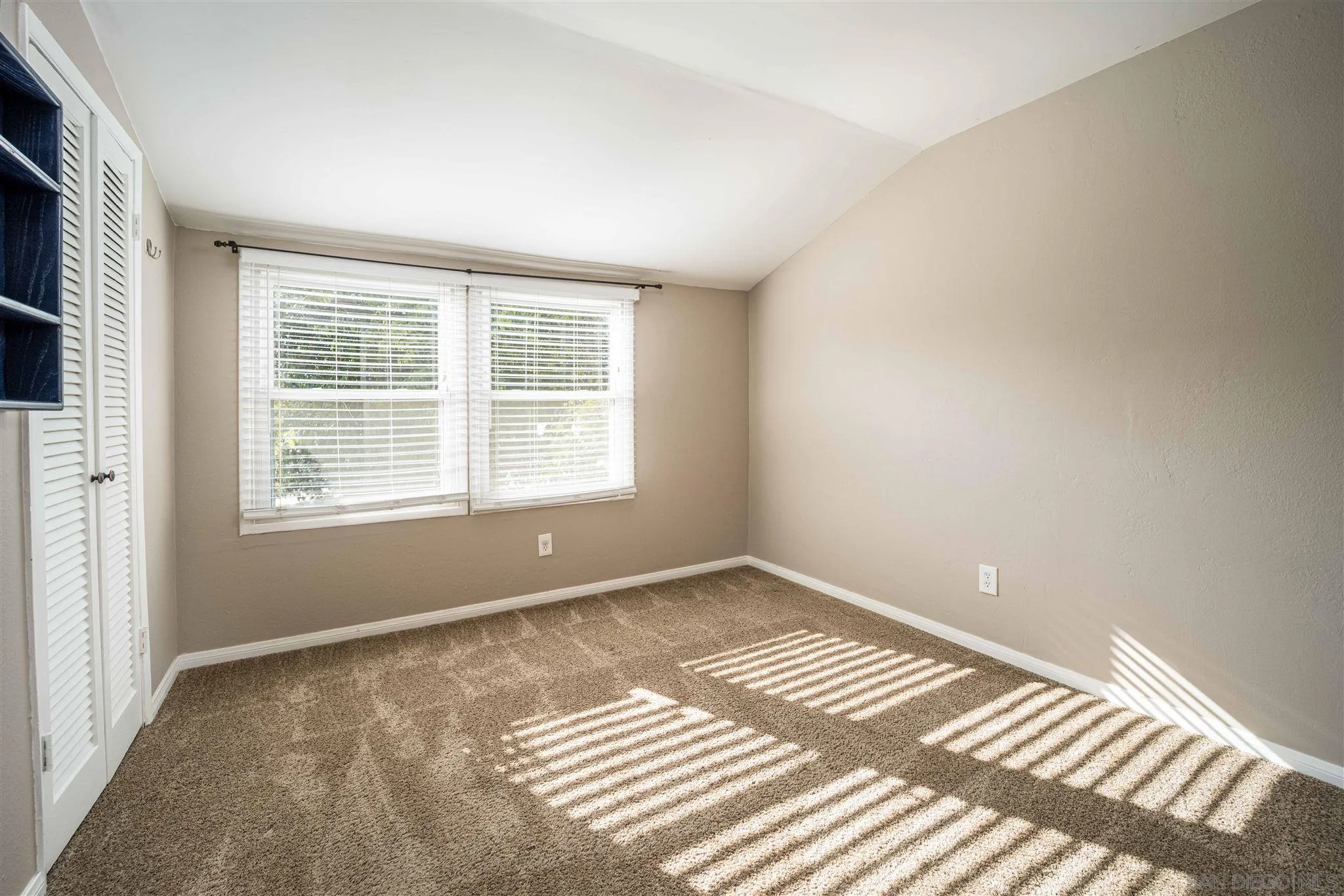 962 Wilfred Street El Cajon, CA 92021 - Photo 19 of 27 a view of an empty room with a window