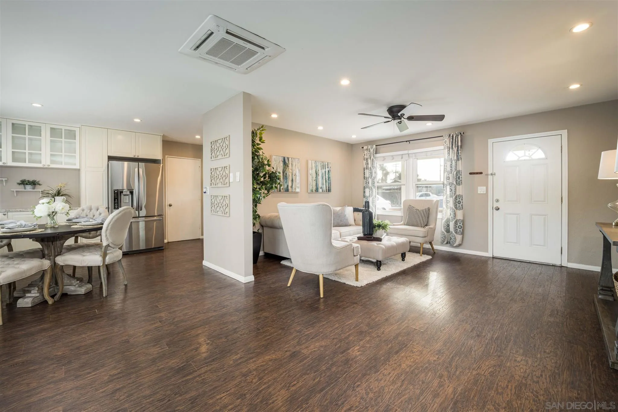962 Wilfred Street El Cajon, CA 92021 - Photo 23 of 27 a living room with furniture and wooden floor