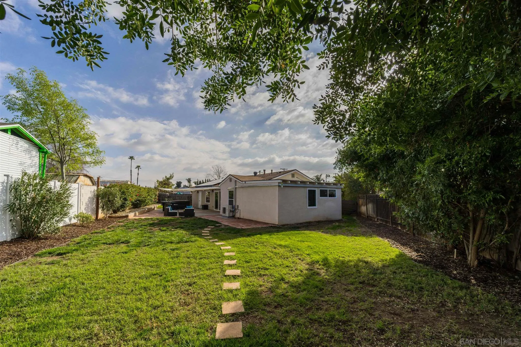 962 Wilfred Street El Cajon, CA 92021 - Photo 4 of 27 a view of a house with a big yard