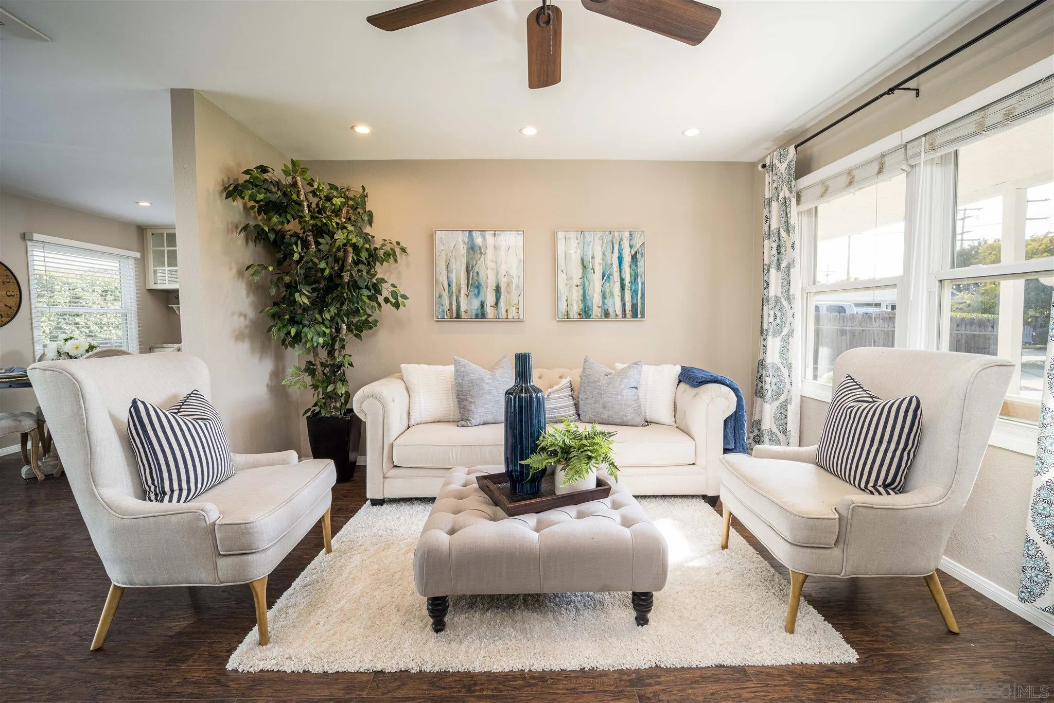 962 Wilfred Street El Cajon, CA 92021 - Photo 8 of 27 a living room with furniture and a large window
