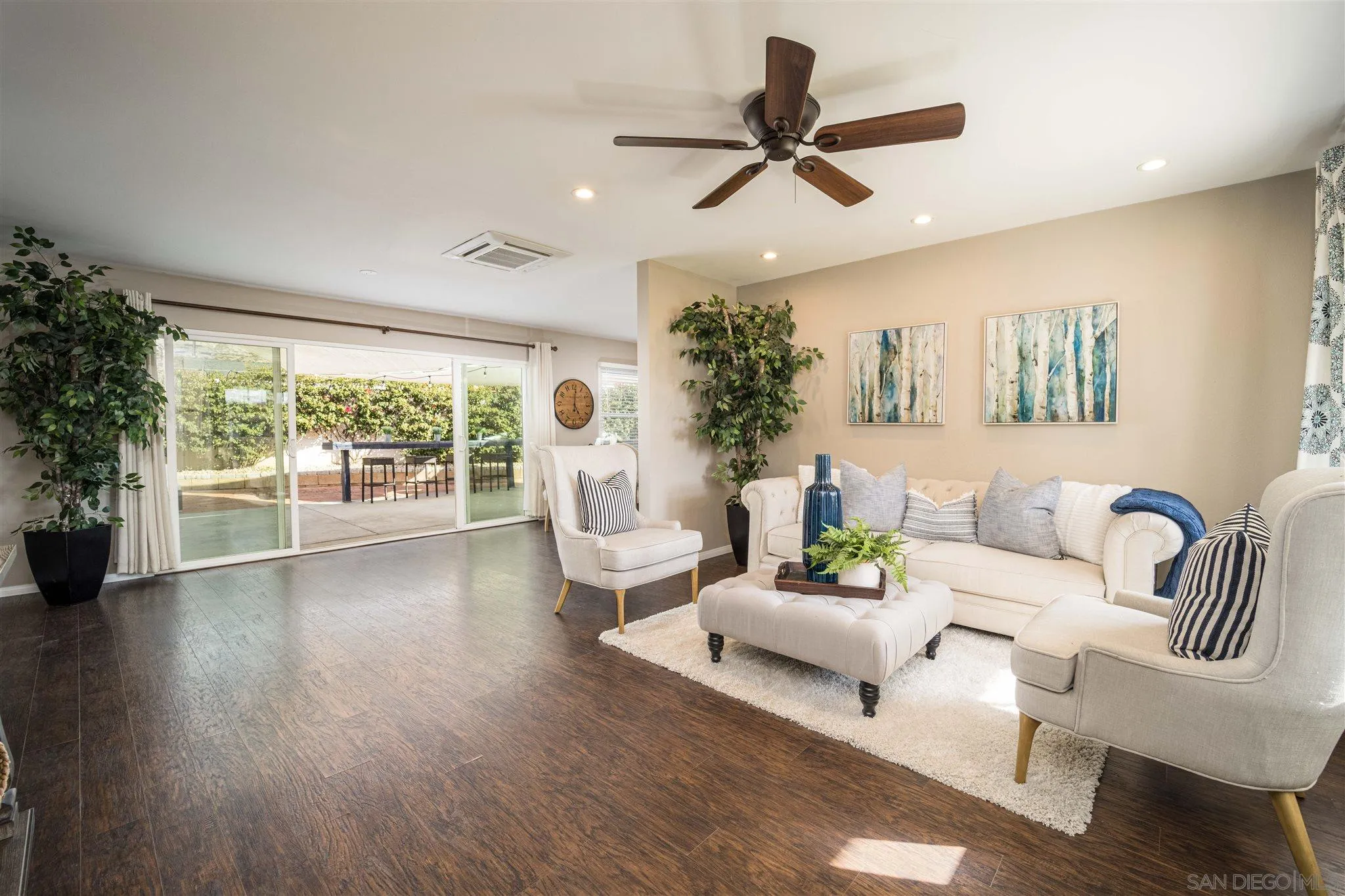 962 Wilfred Street El Cajon, CA 92021 - Photo 9 of 27 a living room with furniture and a large window