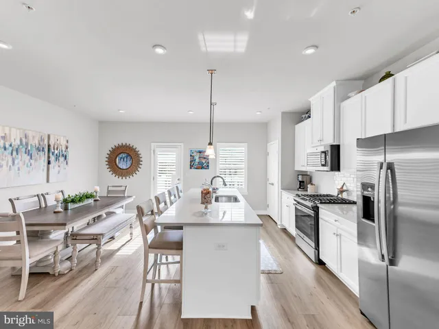 a bed room with a bed and a television