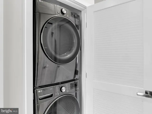 a view of a hallway with a chandelier