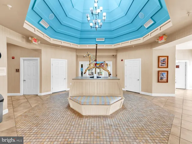 a view of swimming pool with outdoor seating and yard in the back