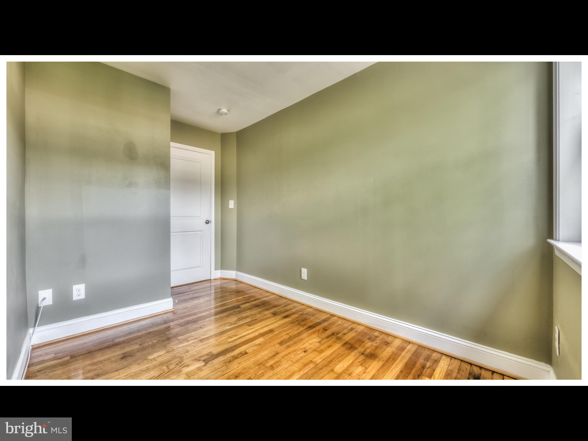 836 Bradhurst Road Baltimore, MD 21212 - Photo 17 of 24 a view of an empty room and window